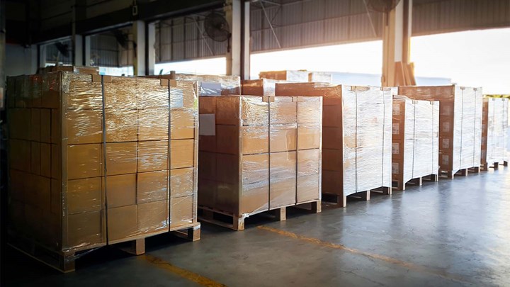 Several pallets of cargo have been delivered in the goods reception.