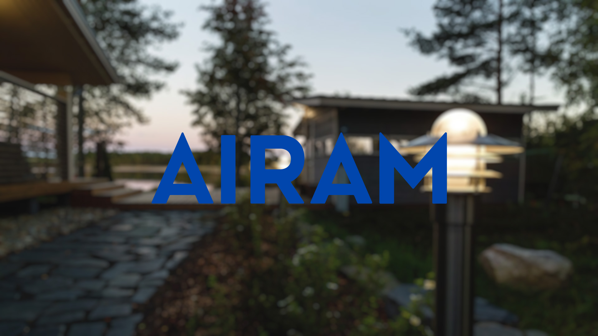 Image of a modern yard at dusk with a glowing outdoor light, trees, and a house. AIRAM logo is prominent in the center.