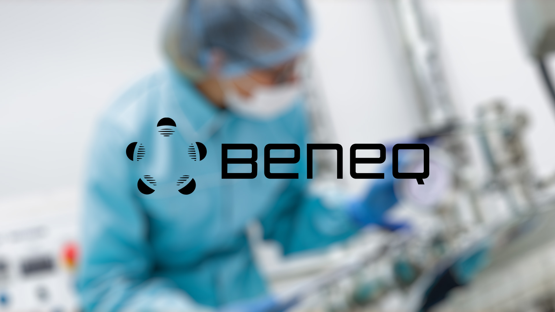 Image of a lab technician in a blue protective suit and mask working with equipment. Beneq logo is prominently displayed in the foreground.